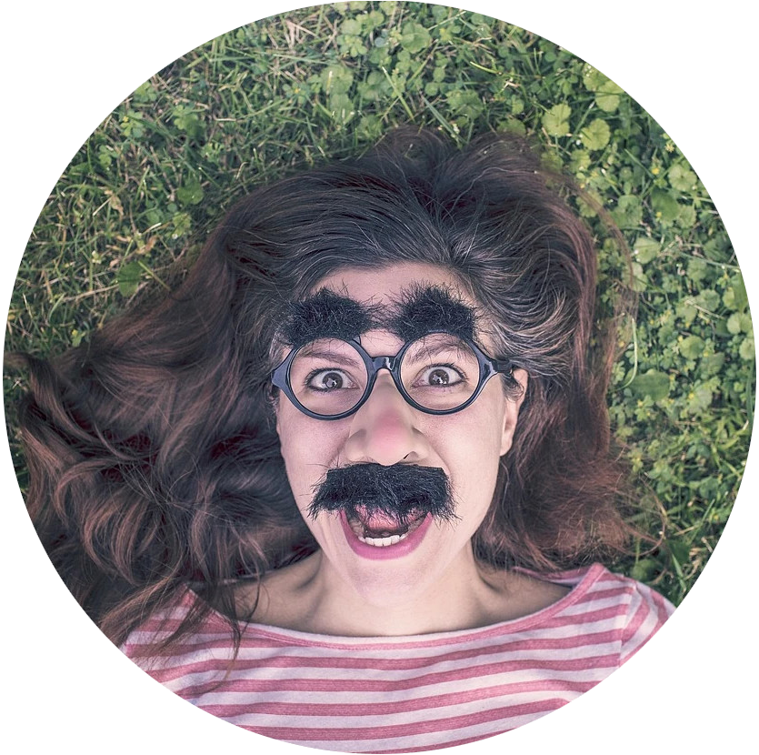 young adult wearing funny glasses and mustache